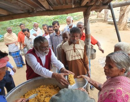 4. Pastor Frank serving the special meal to a patient